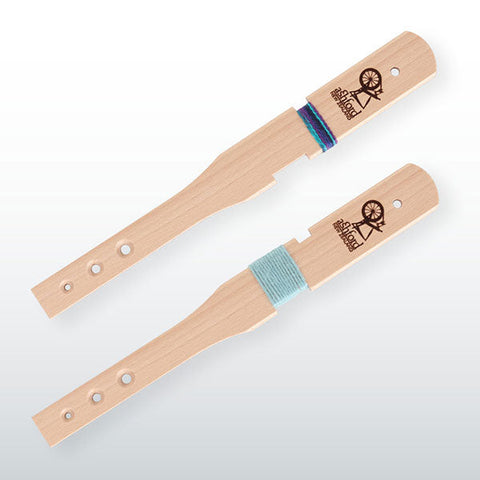 Ashford lacquered beech Diz Stick with fibre-control holes and yarn gauges