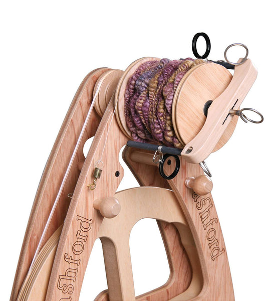 Ashford Joy Freedom Flyer with jumbo bobbin holding textured yarn
