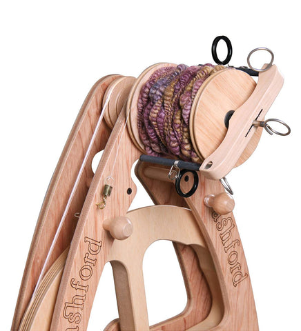 Ashford Joy Freedom Flyer with jumbo bobbin holding textured yarn