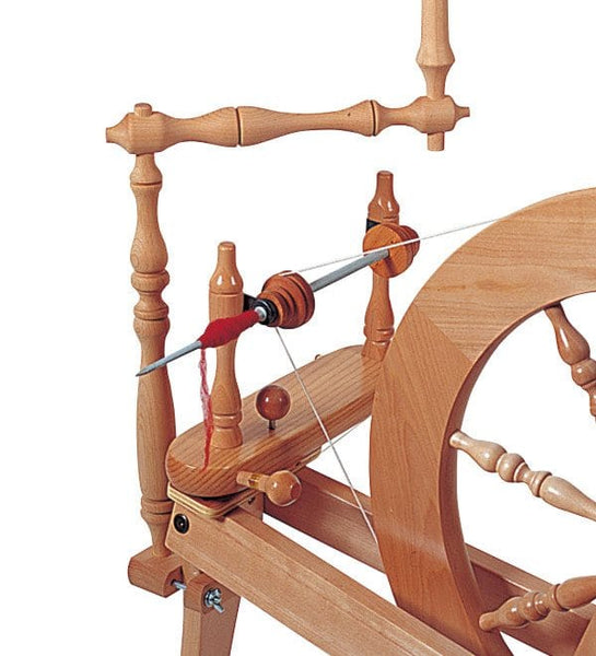 Ashford quill spindle attachment fitted to a spinning wheel