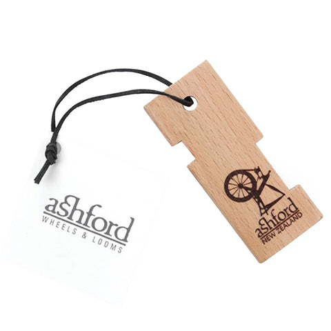 Ashford silver-beech yarn gauge with half-inch and one-inch wraps-per-inch slots